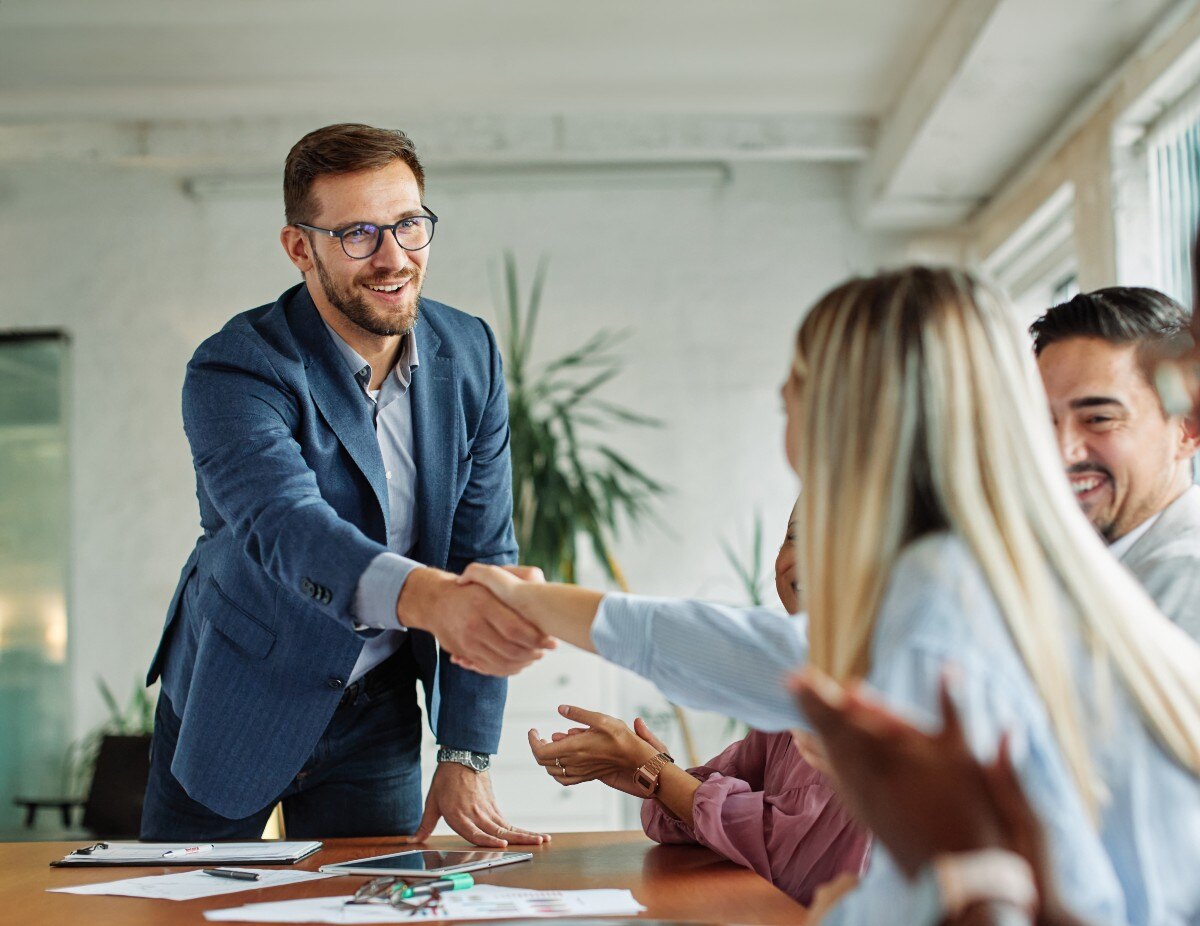 business man handshaking a colleague
